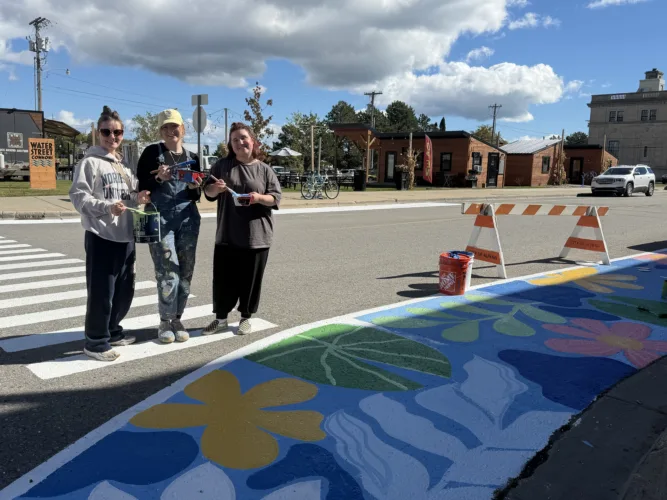 Artists paint new artwork downtown